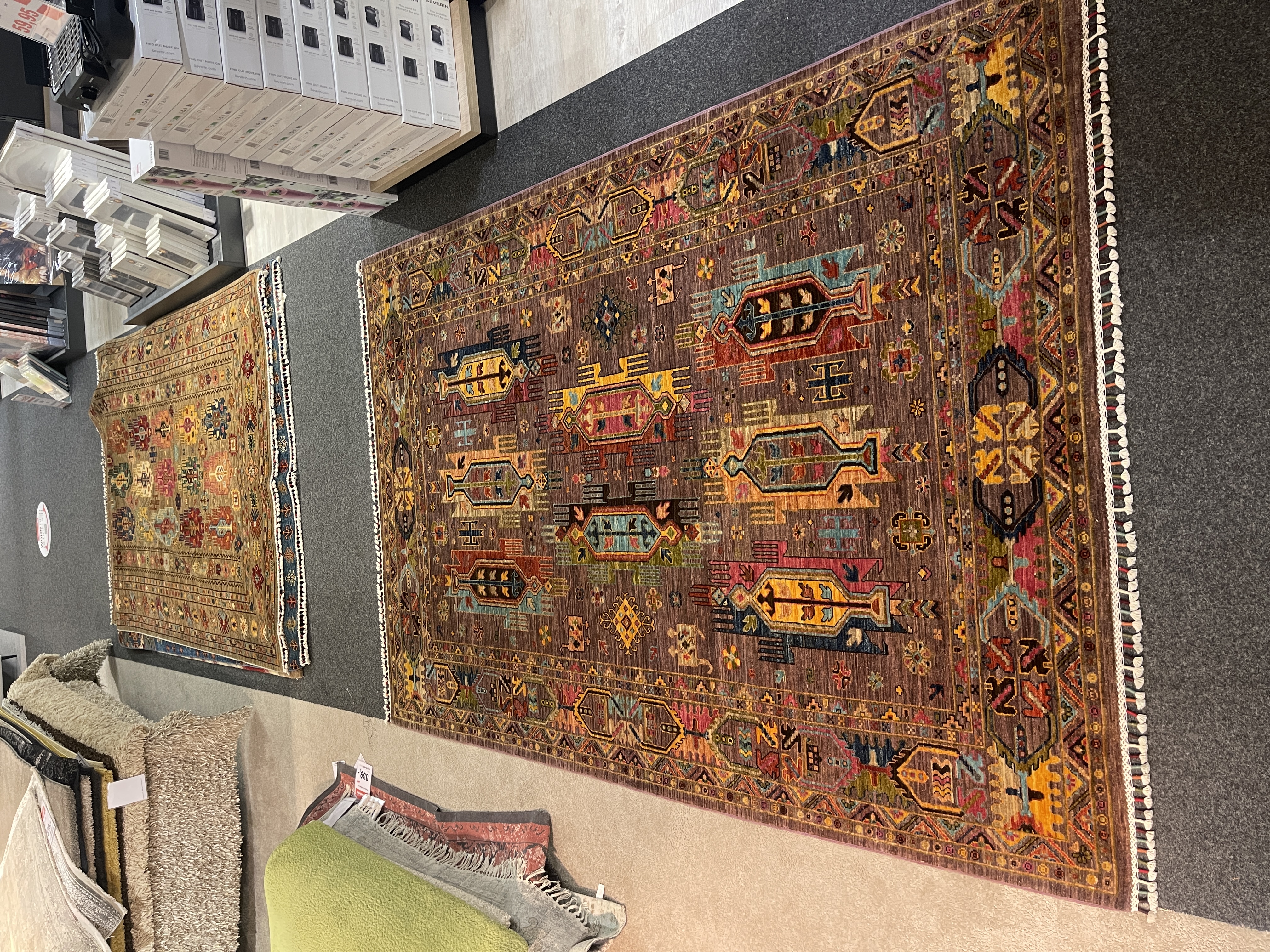 Gila Teppich Uzbek in braun, ca. 258x175 cm, mit bunten Mustern und Fransen, Ausstellungsstück.