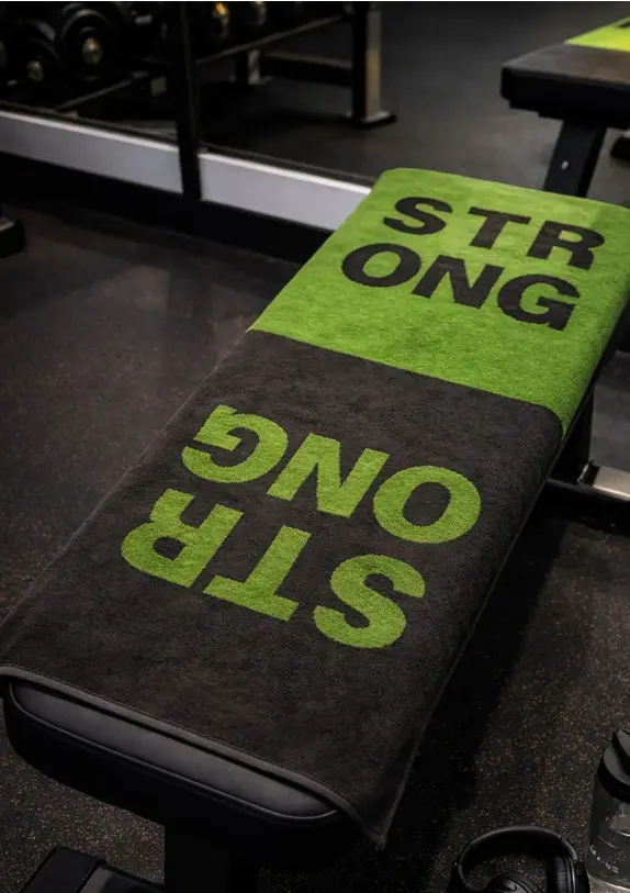CAWÖ Textil Gym Towel "Stronger" grün/grau 50x130 cm
